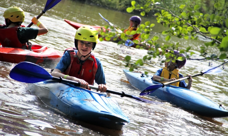 learn kayaking at elderflower fields festival